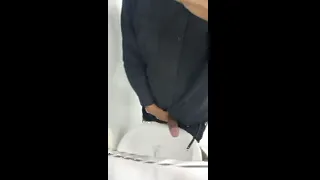 Office boy jerks off on public works bathroom