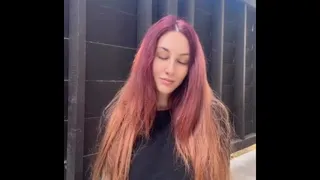 Artemisia Love long hair fetish smoking a cigarette outdoor