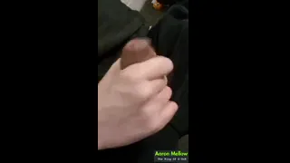 Wrapping and stroking a hard thick cock while precum flows down.