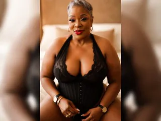 Ebony Auntie offers you some milk