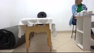 Anal exam with the doctor's finger in her anus and breast exam.