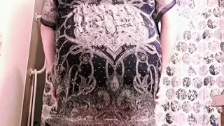 Fat femboy shakes hips in short dress