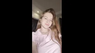 Big tits press against thin pink shirt 🤫