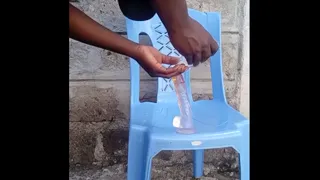 Big black ass bottom fucking his asshole with a dildo outside