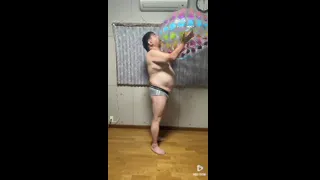 Blowing up inflatable -Beachball