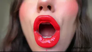 Red sticky messy lipgloss layers and pouting kisses