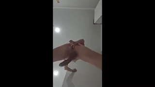 First, Roxana jerked off standing up, then came and used the leftover cum to lube up her ass