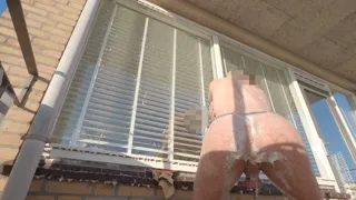 Locked-up naked guy washing windows and soaping himself down