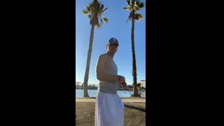 Boy in white shorts shows off
